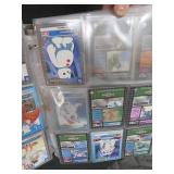 LARGE BOOK FILLED WITH YU-GI-OH / MISC. COLLECTABLE CARDS.