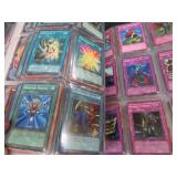 LARGE BOOK FILLED WITH YU-GI-OH / MISC. COLLECTABLE CARDS.