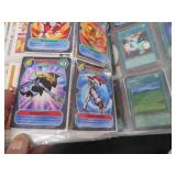 LARGE BOOK FILLED WITH YU-GI-OH / MISC. COLLECTABLE CARDS.