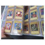 LARGE BOOK FILLED WITH YU-GI-OH / MISC. COLLECTABLE CARDS.