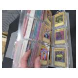 LARGE BOOK FILLED WITH YU-GI-OH / MISC. COLLECTABLE CARDS.