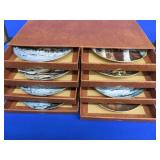 8 NUMBERED COLLECTOR PLATES IN SEPARATE DRAWERED CASE.