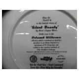 8 NUMBERED COLLECTOR PLATES IN SEPARATE DRAWERED CASE.