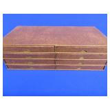 8 NUMBERED COLLECTOR PLATES IN SEPARATE DRAWERED CASE.