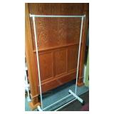 Rolling Clothing Rack.