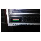 Sharp AC/DC Television and VHS Deck.