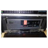 Sharp AC/DC Television and VHS Deck.