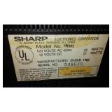 Sharp AC/DC Television and VHS Deck.