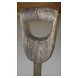 Antique wood and metal shovel