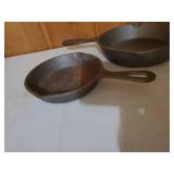 Two Cast Iron Skillets