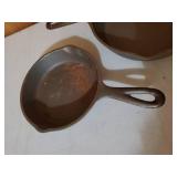 Two Cast Iron Skillets