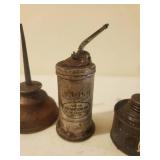 Three Old Oil Cans