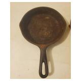 Two Vintage Pieces Of Cast Iron