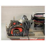 small Inverter and looks to me like a winch control and plug wires