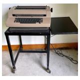 Vintage Sperry Remington Typewriter on a Vintage Extending Metal Table on Casters