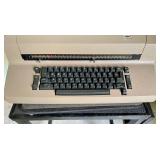 Vintage Sperry Remington Typewriter on a Vintage Extending Metal Table on Casters