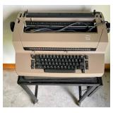 Vintage Sperry Remington Typewriter on a Vintage Extending Metal Table on Casters