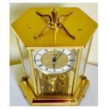 Brilliant Brass Howard Miller Clock with Etched Glass Accents