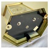 Brilliant Brass Howard Miller Clock with Etched Glass Accents