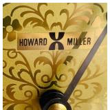 Brilliant Brass Howard Miller Clock with Etched Glass Accents