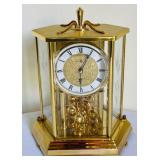 Brilliant Brass Howard Miller Clock with Etched Glass Accents
