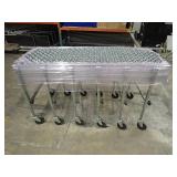 Assembly Line Roller // Has castor wheels for easy mobility // can extend to 22ft long // line wheels are metal for smooth rolling