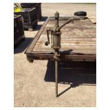 Vintage cast iron hand crank oil pump