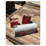 Mailbox and two gas cans