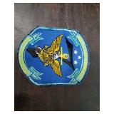 Four Military Patches and Antique Monark 12 GA Shotgun Box