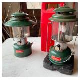 Two Used Coleman Lanterns with One Having a Case