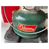 Two Used Coleman Lanterns with One Having a Case