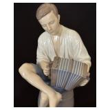 Bing and Grøndahl Boy Playing the Accordion Figurine No. 1661