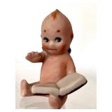 Antique Kewpie Doll Holding a Book