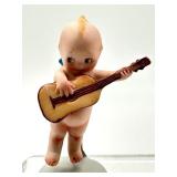 Antique Kewpie Bisque Doll Playing Guitar
