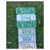 Board Full of Motorcycle License Plates Starting with ND 1967
