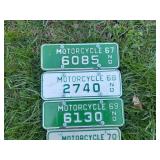 Board Full of Motorcycle License Plates Starting with ND 1967