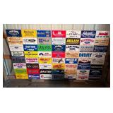 Board Full of Advertising License Plates