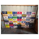 Board Full of Advertising License Plates