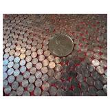 Large Saw Blade Covered in US Pennies