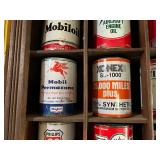 All Oil Cans Pictured in Cabinet