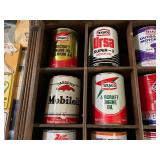 All Oil Cans Pictured in Cabinet
