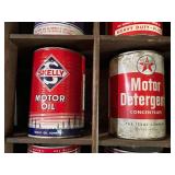 All Oil Cans Pictured in Cabinet