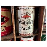 All Oil Cans Pictured in Cabinet