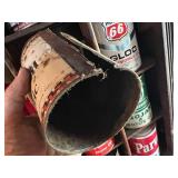 All Oil Cans Pictured in Cabinet