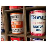 All Oil Cans Pictured in Cabinet