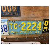 License Plates on Shelf & Wall