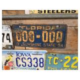 License Plates on Shelf & Wall