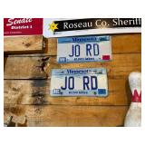 License Plates on Shelf & Wall