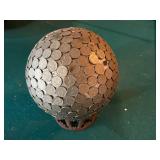 Globe Covered in Nickels on Base