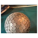 Globe Covered in Nickels on Base